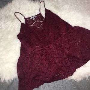 Cute burgundy top with lace detailing